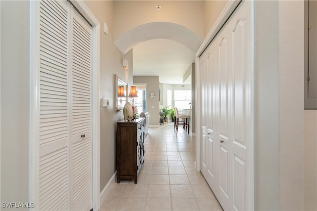 hallway with light tile patterned floors