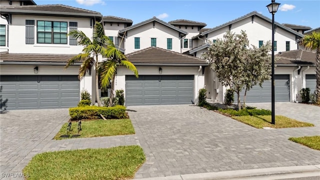 view of front of property with a garage