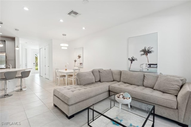 tiled living room with sink