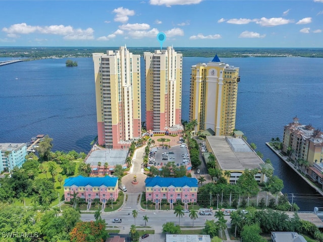 birds eye view of property featuring a water view