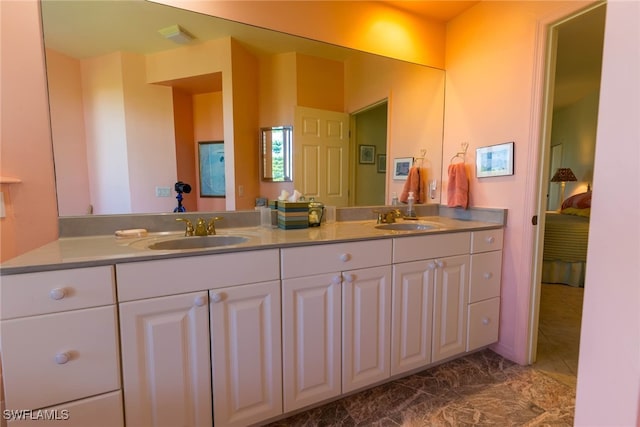 bathroom featuring tile patterned floors and vanity