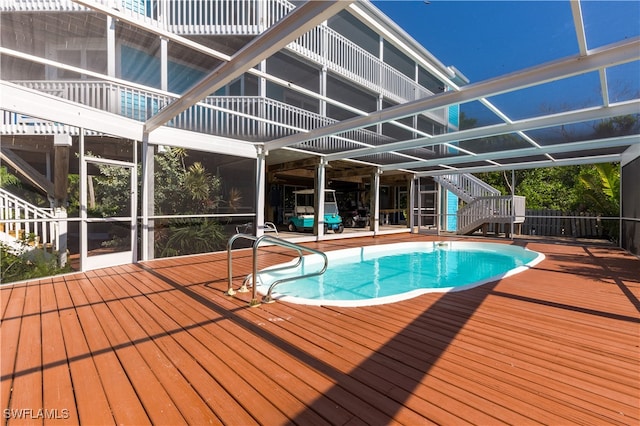 view of pool with a wooden deck