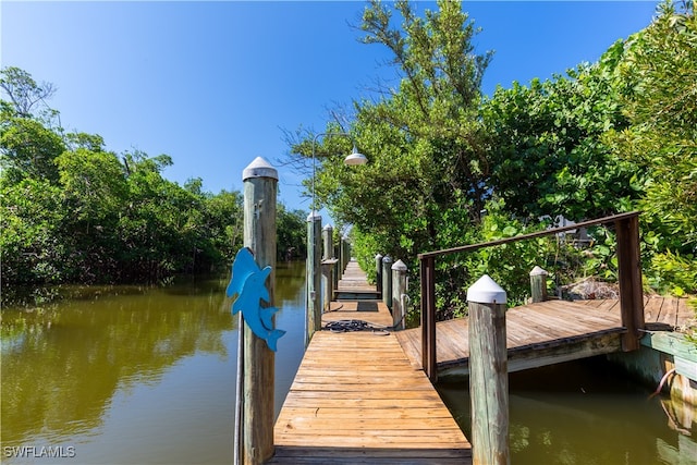 view of dock with a water view