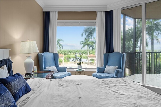 bedroom featuring crown molding and access to exterior