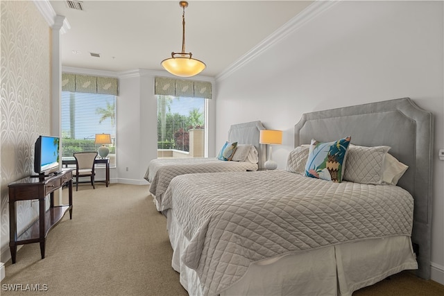 bedroom with crown molding and light colored carpet