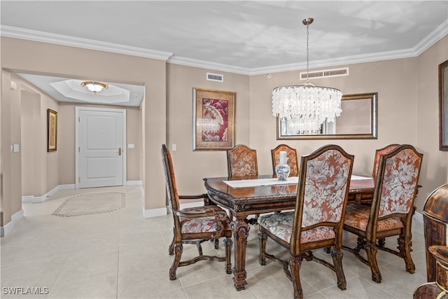 tiled dining space featuring crown molding and a chandelier