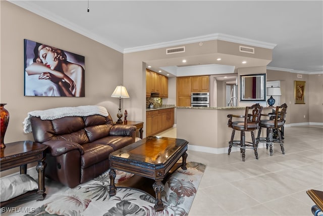 living room with crown molding and light tile patterned floors