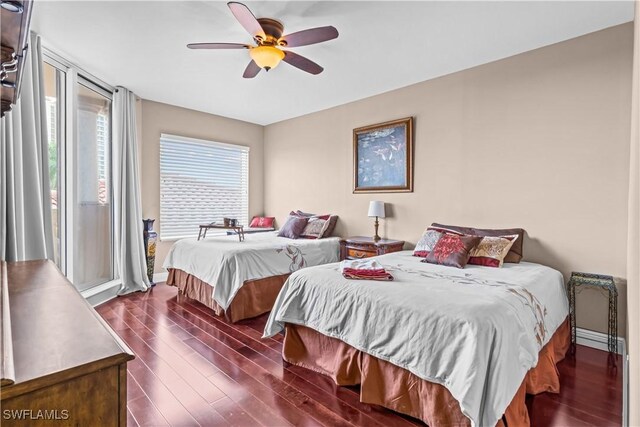 bedroom featuring dark wood-type flooring and ceiling fan