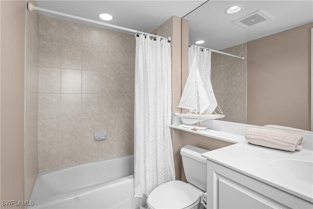 full bathroom with vanity, toilet, and shower / bathtub combination with curtain