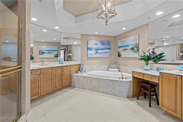 bathroom featuring vanity, independent shower and bath, a raised ceiling, and tile patterned flooring