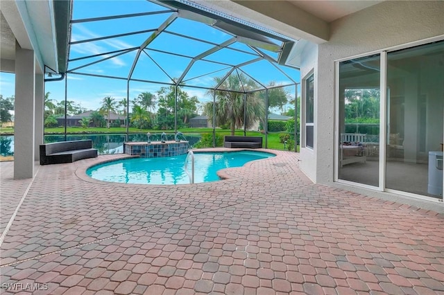 15120 Blackhawk Dr, Fort Myers, FL 33912 - swimming pool with a jacuzzi, a patio, and glass enclosure