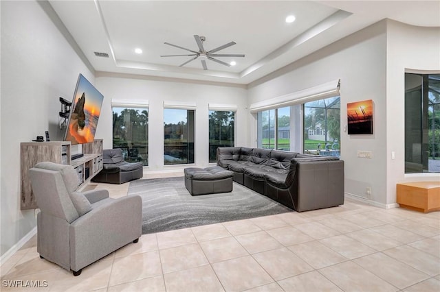 15120 Blackhawk Dr, Fort Myers, FL 33912 - living area featuring ceiling fan, a raised ceiling, light tile patterned flooring, and recessed lighting