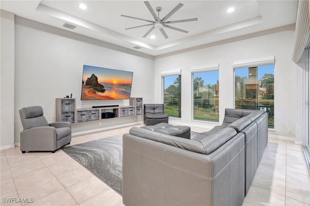 15120 Blackhawk Dr, Fort Myers, FL 33912 - living area featuring a tray ceiling, light tile patterned floors, a ceiling fan, and recessed lighting