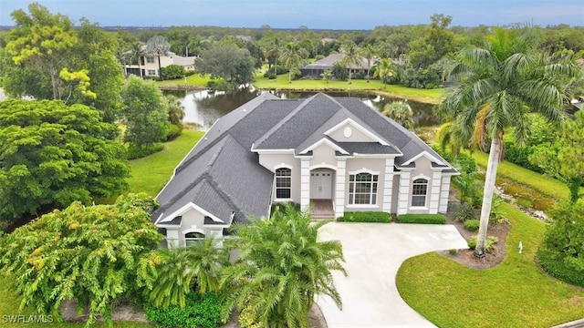 view of front of home featuring a water view and a front yard