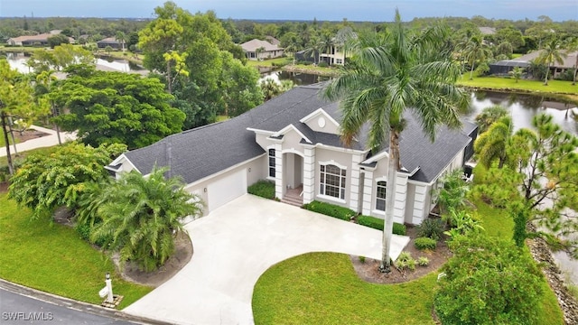 15120 Blackhawk Dr, Fort Myers, FL 33912 - aerial view of residential area featuring a large body of water and a tree filled landscape