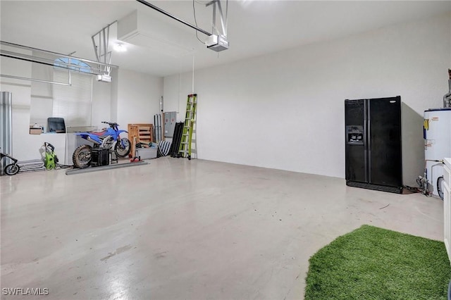 15120 Blackhawk Dr, Fort Myers, FL 33912 - garage featuring a garage door opener, black fridge with ice dispenser, and gas water heater