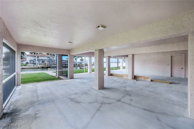 view of patio featuring a water view