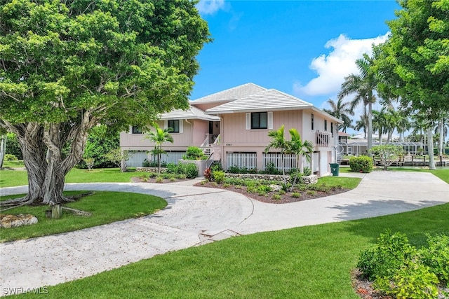 view of front of house with a front lawn