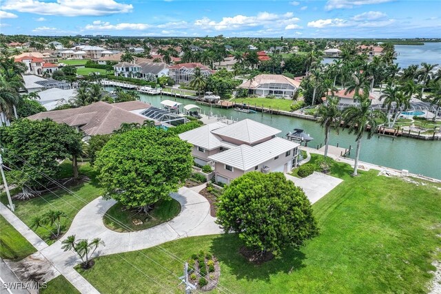 drone / aerial view with a water view