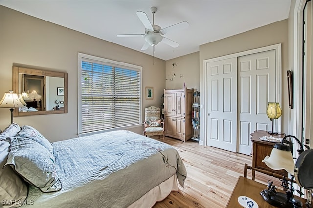 bedroom featuring a closet, ceiling fan, and light hardwood / wood-style floors