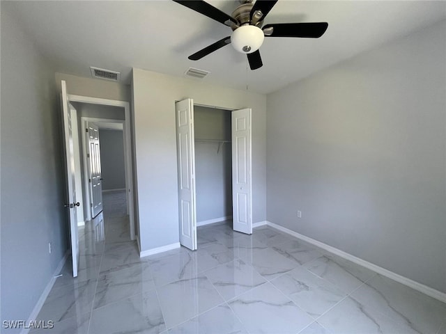 unfurnished bedroom featuring ceiling fan and a closet