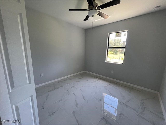 empty room featuring ceiling fan