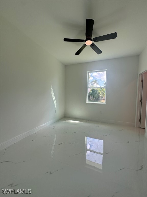 unfurnished room with ceiling fan