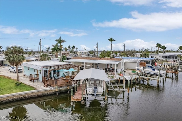 view of dock featuring a water view and boat lift