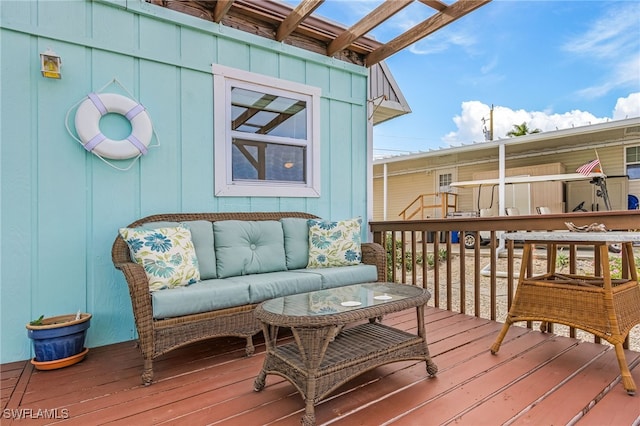 wooden deck featuring an outdoor hangout area