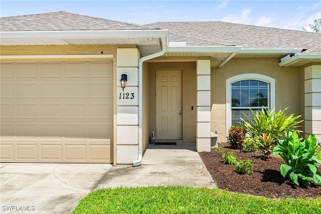 entrance to property with a garage