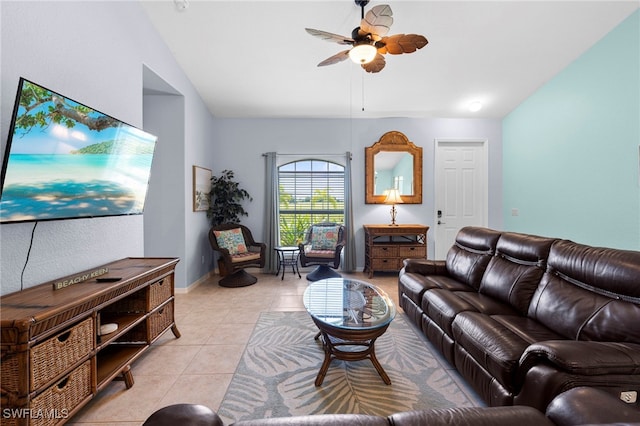 tiled living room featuring ceiling fan