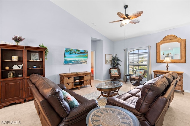 living room with high vaulted ceiling, ceiling fan, and light tile patterned floors