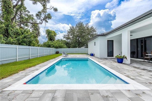 view of pool with a patio area, a fenced backyard, and a fenced in pool