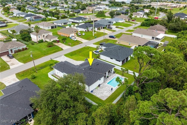 drone / aerial view with a residential view