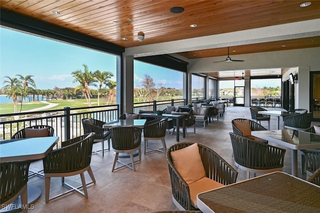 view of patio featuring ceiling fan