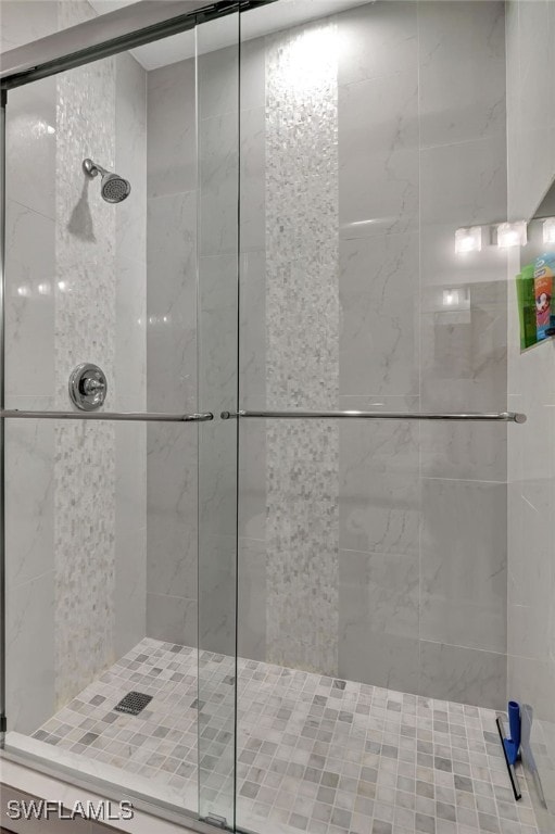 bathroom featuring a stall shower