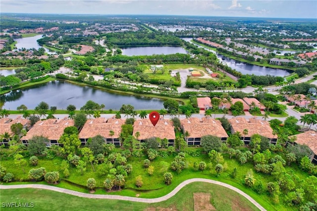 drone / aerial view with a water view