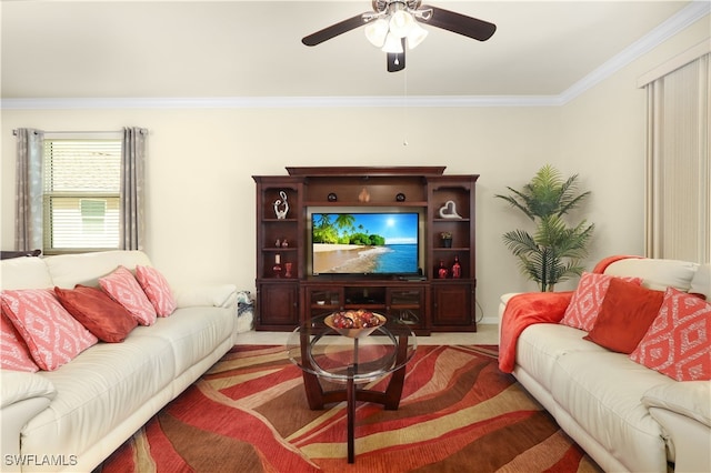 living room with ceiling fan and ornamental molding