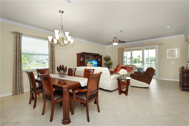 dining area with ceiling fan with notable chandelier, a healthy amount of sunlight, and light tile patterned floors