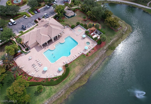 drone / aerial view with a water view