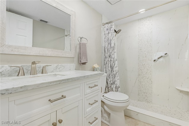 full bath featuring toilet, vanity, visible vents, and a shower stall