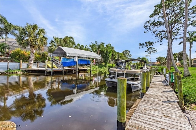 view of dock with a water view and boat lift