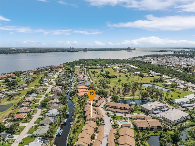 bird's eye view featuring a residential view and a water view