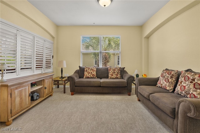 living room with light colored carpet