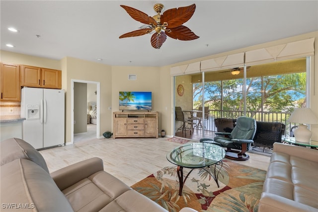 living room with ceiling fan