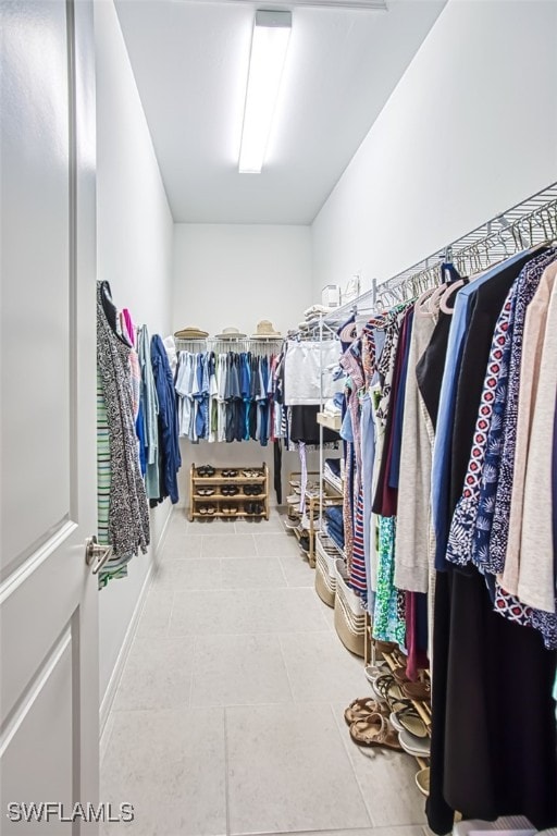 walk in closet featuring tile patterned floors