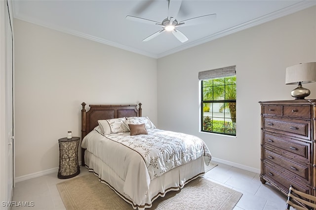 bedroom featuring ceiling fan, ornamental molding, and light tile patterned floors