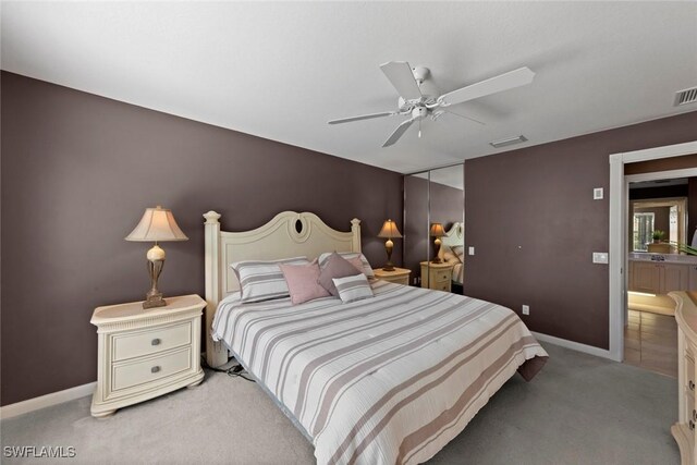 carpeted bedroom featuring ceiling fan