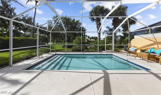 view of swimming pool with a patio, glass enclosure, and outdoor lounge area