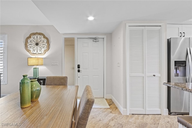 dining room with light hardwood / wood-style floors